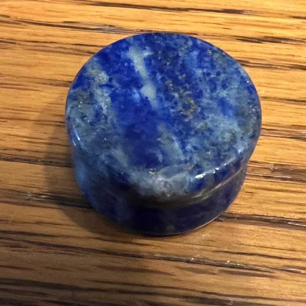 Double flare stone plug for stretched earlobe. Stone is sodalite, size 20 mm.